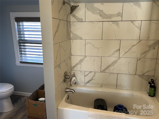 bathroom featuring toilet and hardwood / wood-style flooring