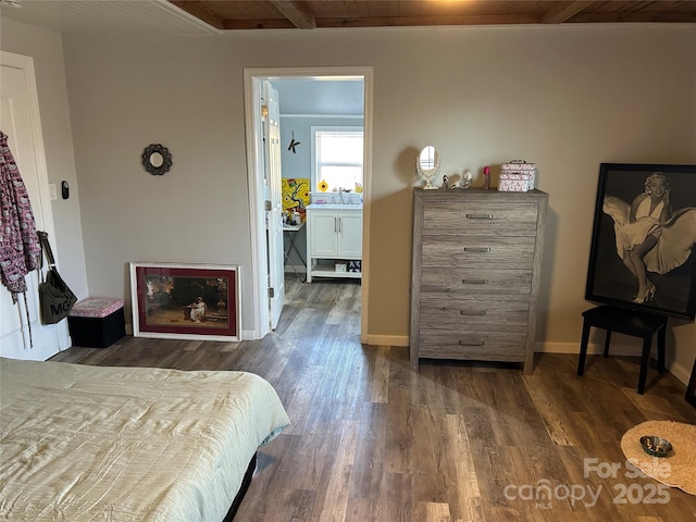 bedroom featuring sink, dark wood-type flooring, and wood ceiling