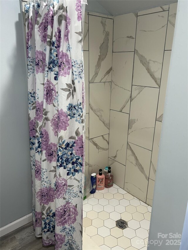 bathroom featuring walk in shower