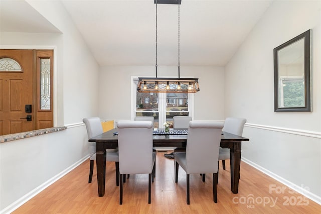 dining space featuring light hardwood / wood-style floors