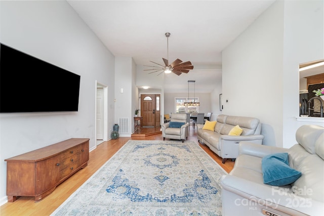 living room with light hardwood / wood-style flooring