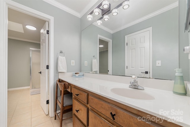 bathroom with walk in shower, ornamental molding, tile patterned floors, and vanity