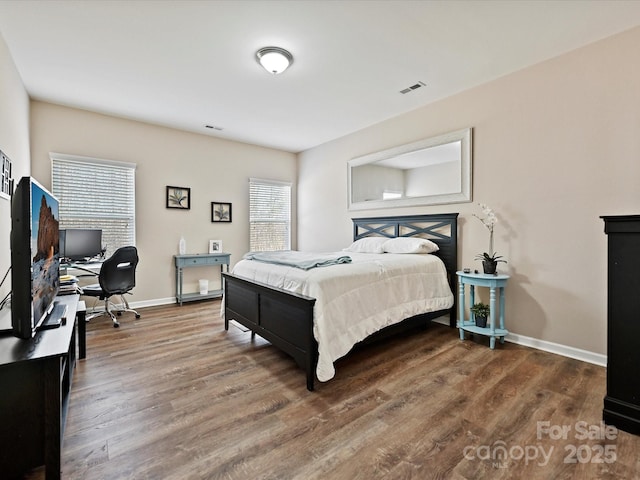 bedroom featuring wood-type flooring