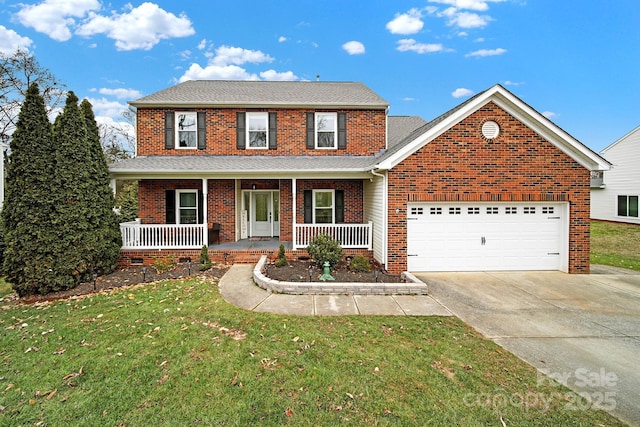 view of property with a front yard, a porch, and a garage