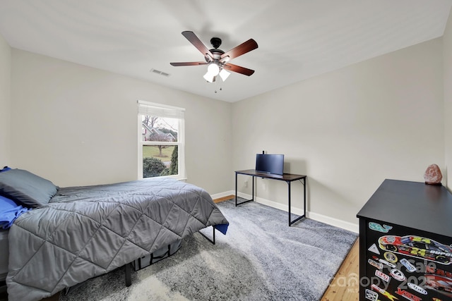 bedroom featuring ceiling fan and wood-type flooring