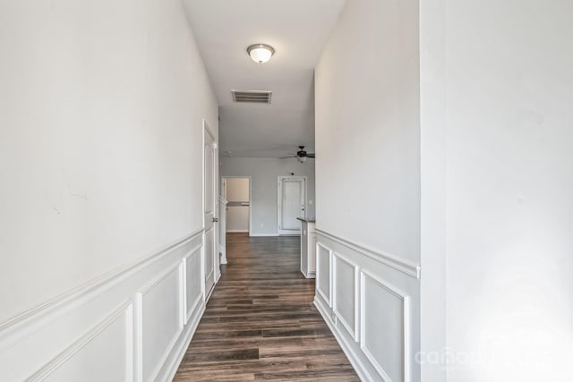 hall featuring dark hardwood / wood-style floors