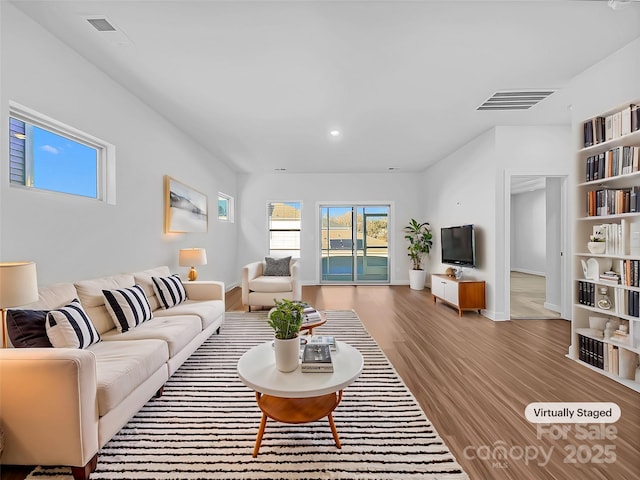 living room featuring light wood-type flooring