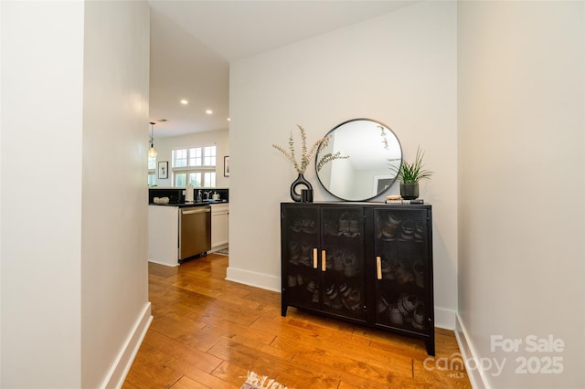 hallway featuring light hardwood / wood-style floors