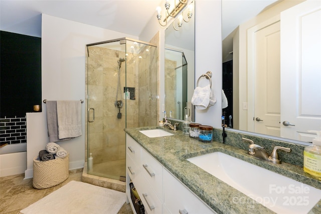 bathroom with vanity, tile patterned flooring, and plus walk in shower