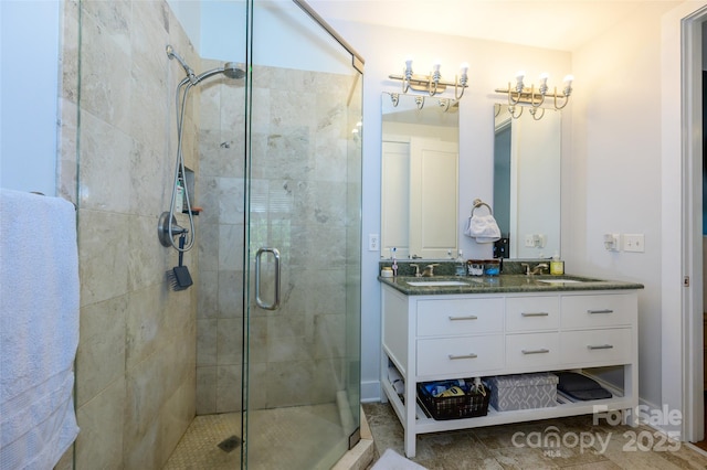 bathroom featuring an enclosed shower and vanity