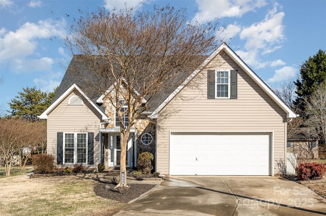 view of front of property with a garage