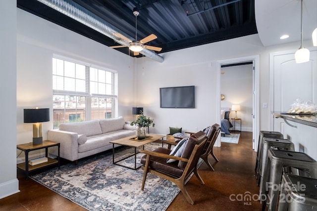 living room featuring ceiling fan