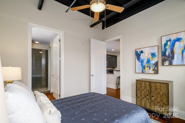 bedroom with beam ceiling, ensuite bath, and ceiling fan