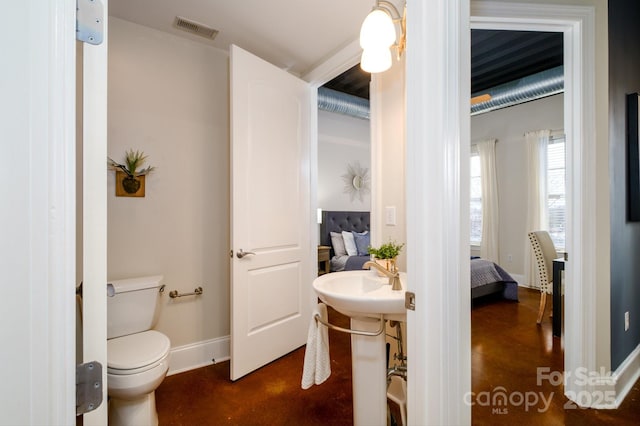 bathroom featuring toilet