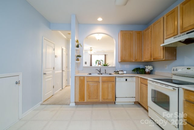 kitchen featuring ceiling fan, sink, and white appliances