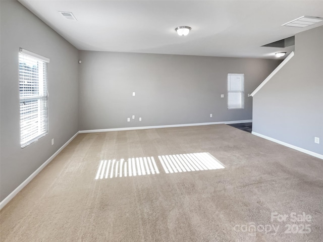 empty room featuring carpet floors