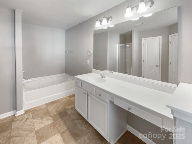 bathroom with independent shower and bath and vanity