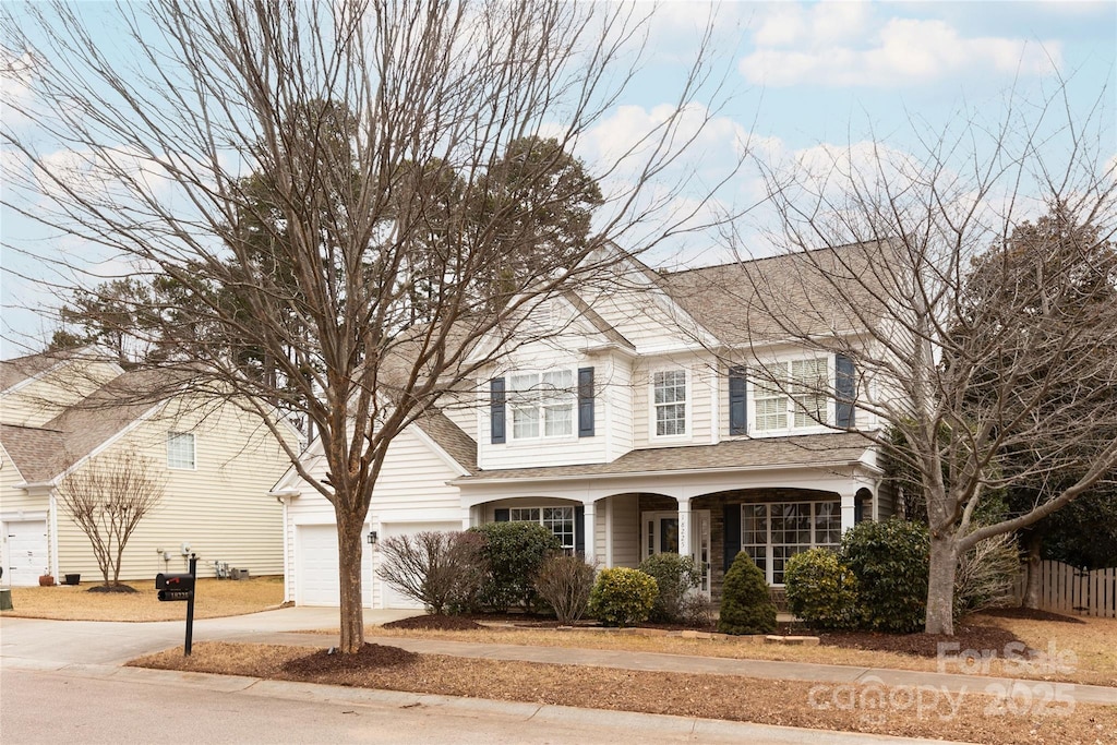 front of property with a garage