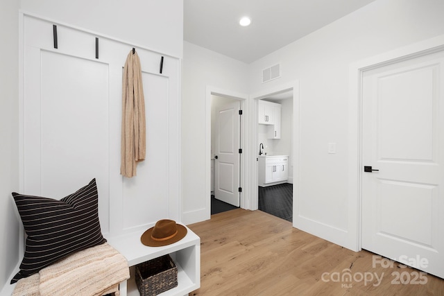 mudroom featuring light hardwood / wood-style flooring