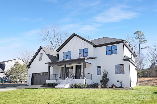 modern farmhouse with a garage, covered porch, and a front lawn