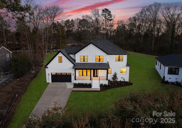 modern farmhouse featuring a lawn