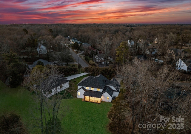 view of aerial view at dusk