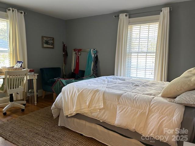 bedroom featuring hardwood / wood-style flooring