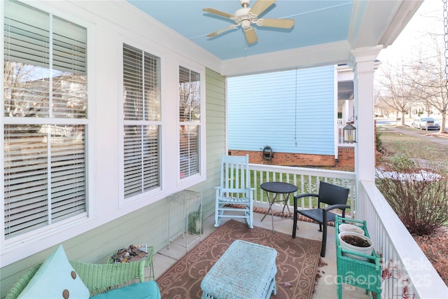 exterior space with ceiling fan and covered porch