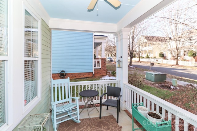 exterior space with ceiling fan