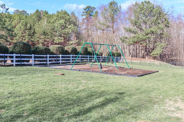 view of jungle gym with a lawn