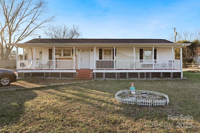 view of front facade with a front lawn and a porch