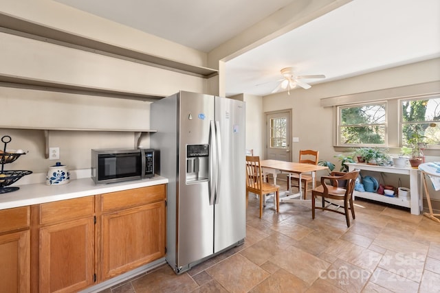 kitchen with ceiling fan and stainless steel appliances