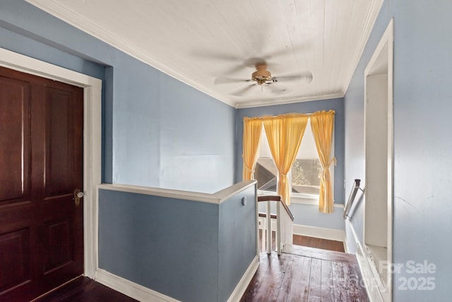 entryway with ceiling fan, wooden ceiling, hardwood / wood-style flooring, and ornamental molding