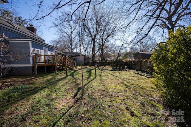 view of yard with a deck