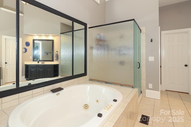 bathroom with vanity, separate shower and tub, and tile patterned flooring