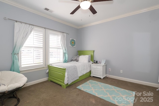 bedroom featuring ceiling fan, crown molding, and dark colored carpet