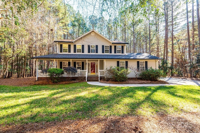 view of front of property featuring a front lawn and a porch