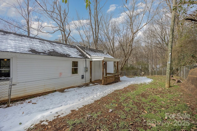 view of snow covered property