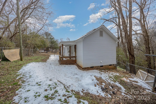 view of snow covered property