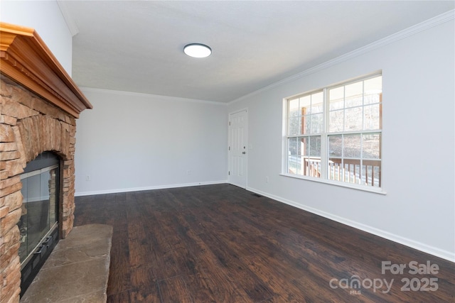 unfurnished living room with crown molding, dark hardwood / wood-style floors, and a fireplace