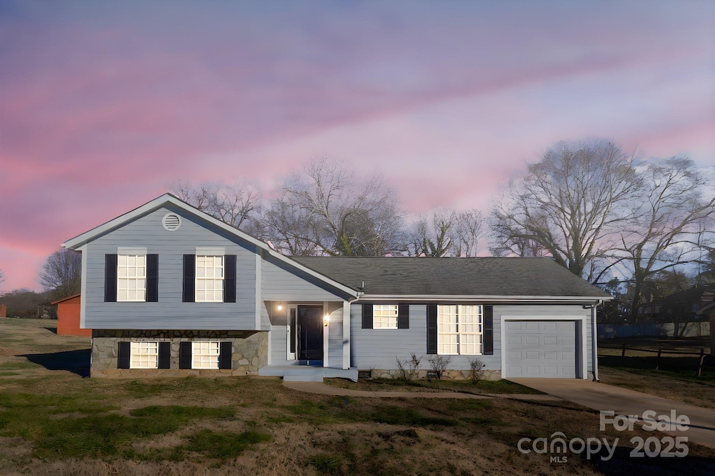 tri-level home featuring a garage