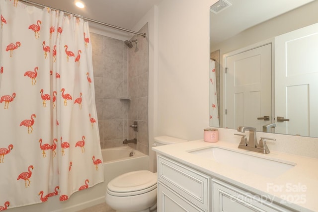 full bathroom featuring toilet, vanity, and shower / tub combo with curtain