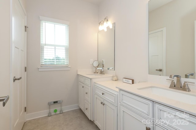 bathroom with vanity and tile patterned floors