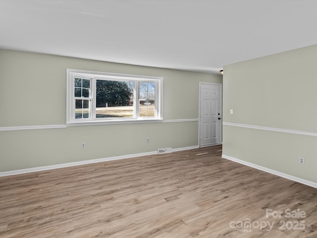 empty room featuring light hardwood / wood-style flooring