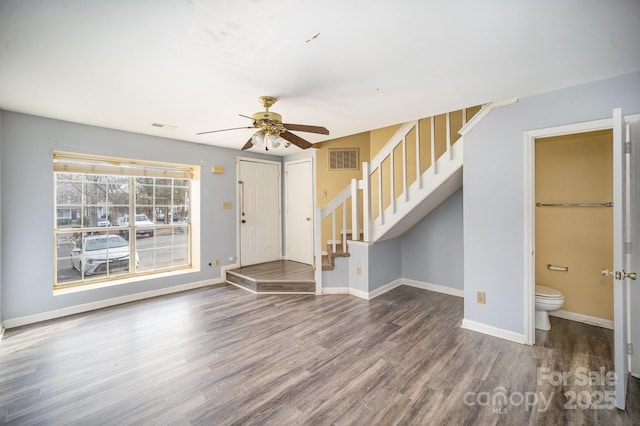 interior space with wood-type flooring and ceiling fan