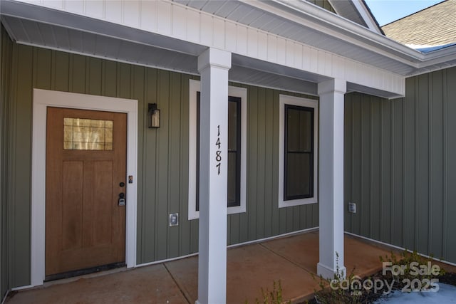 entrance to property with a porch