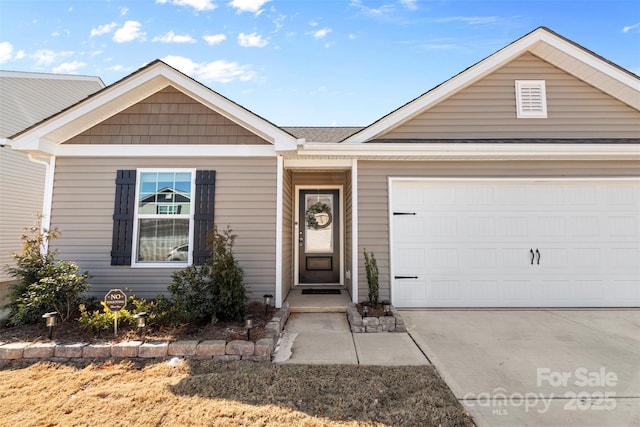 ranch-style home with a garage