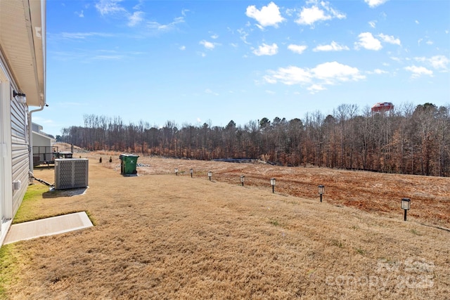 view of yard featuring central AC