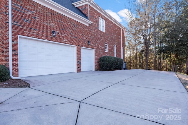 view of home's exterior with a garage