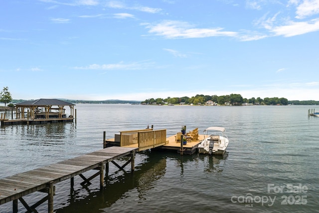 view of dock with a water view